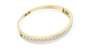 Yellow-gold diamond channel-set bangle with continuous row of round sparkle stones