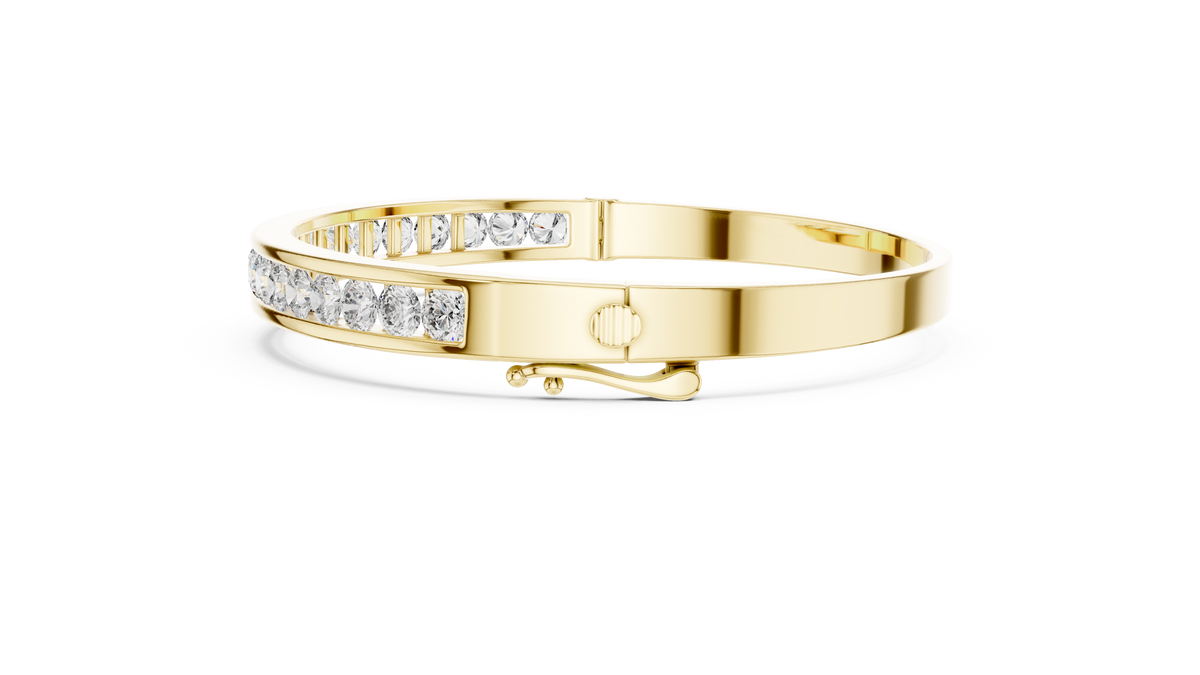 Diamond channel-set bangle with yellow-gold band and inset round stones