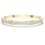 Yellow-gold diamond channel-set bangle with round stones set along the band