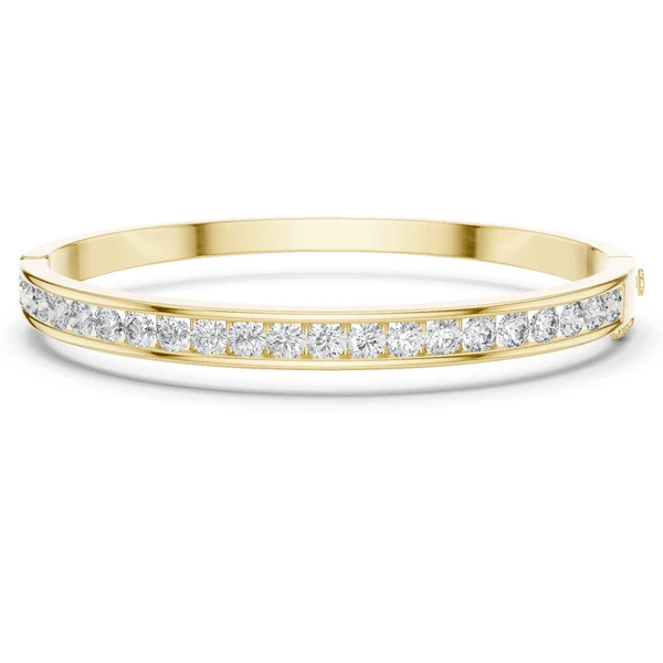 Yellow gold channel-set diamond bangle with a continuous row of round stones.