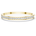 Yellow gold channel-set diamond bangle with a continuous row of round stones.