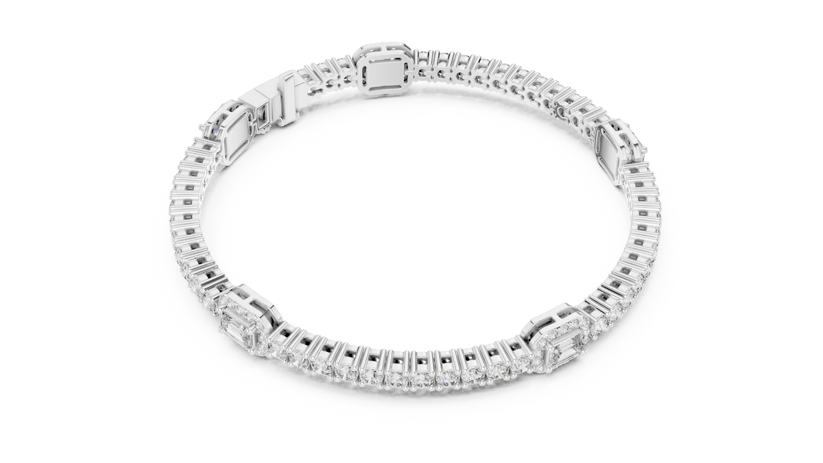 White gold tennis bracelet with rows of diamond pavé and rectangular clasp