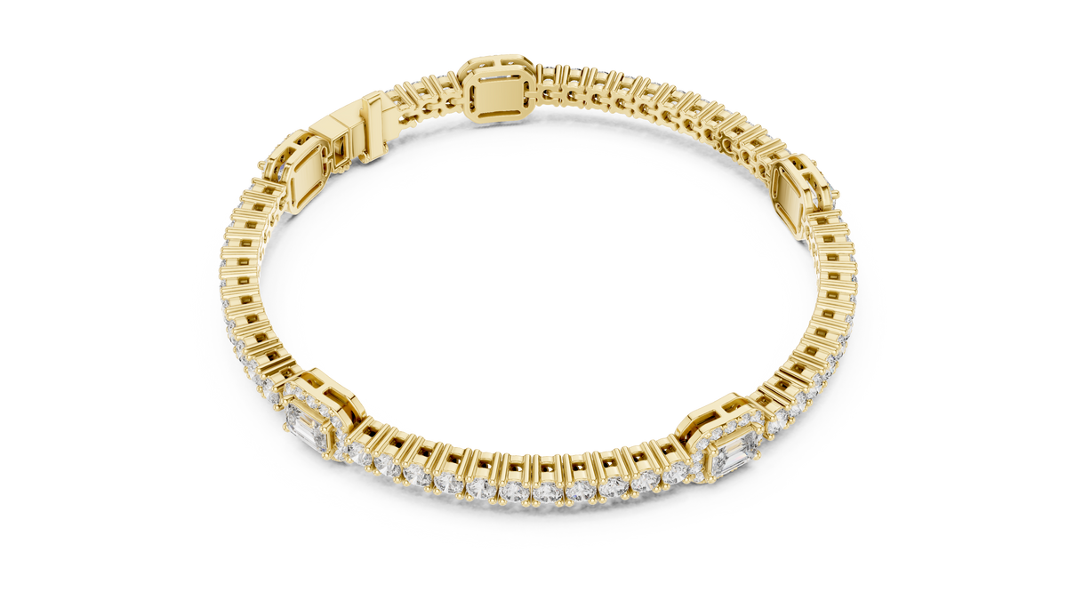 Yellow gold diamond tennis bracelet with emerald-cut center stone and rectangular pave links