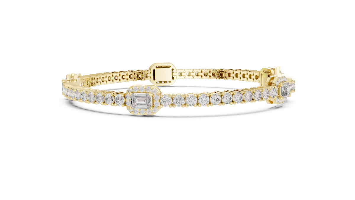 Yellow gold and white diamond tennis bracelet with emerald-cut center stone and pave rows