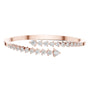 Diamond statement bypass bangle, rose gold with multiple rows of round stones.