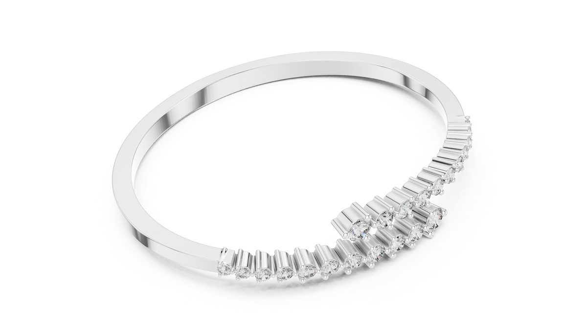 White gold bypass diamond bangle, angled view with pavé round stones.