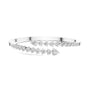 White gold bypass bangle with round diamond pavé accents.