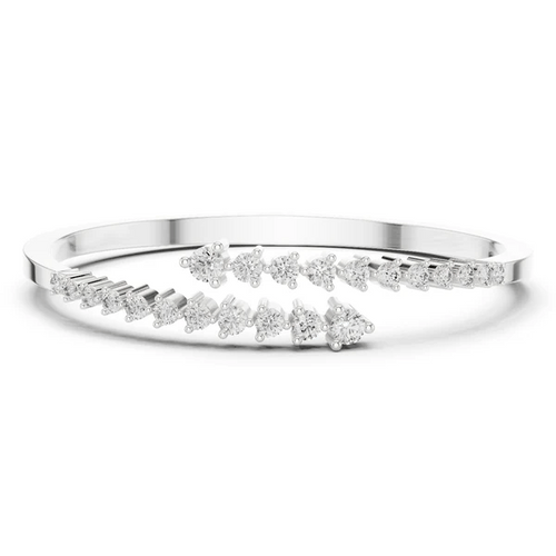 Diamond statement bypass bangle, silver-tone metal with prong-set round diamonds.