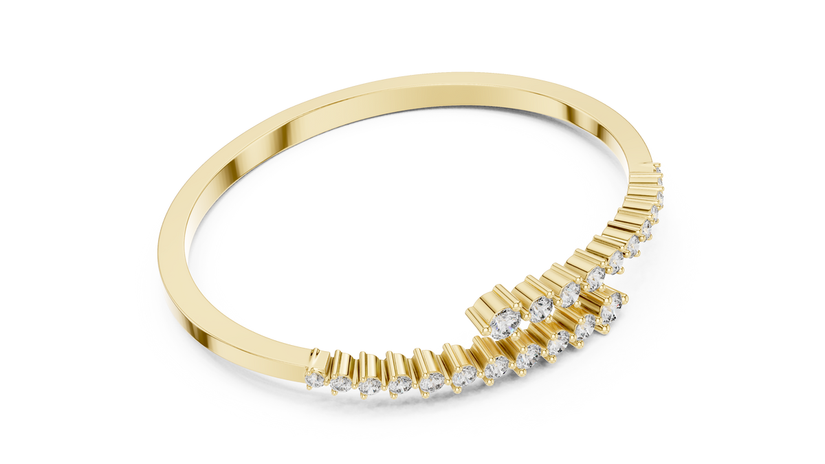 Yellow gold bypass diamond bangle, angled view with pavé round stones.
