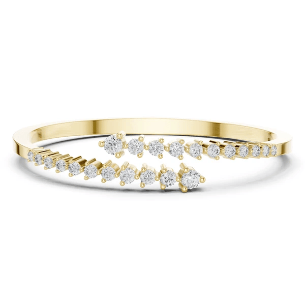 Yellow gold diamond bypass statement bangle with round stones, front view