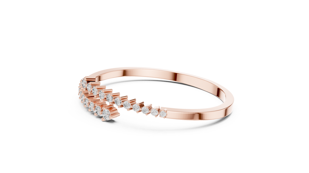 Rose gold bypass bangle with round diamond pavé accents, angled view.