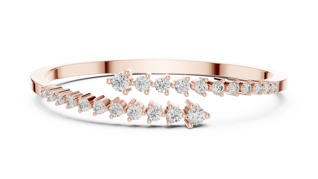 Rose gold bypass bangle with round diamond pavé accents.