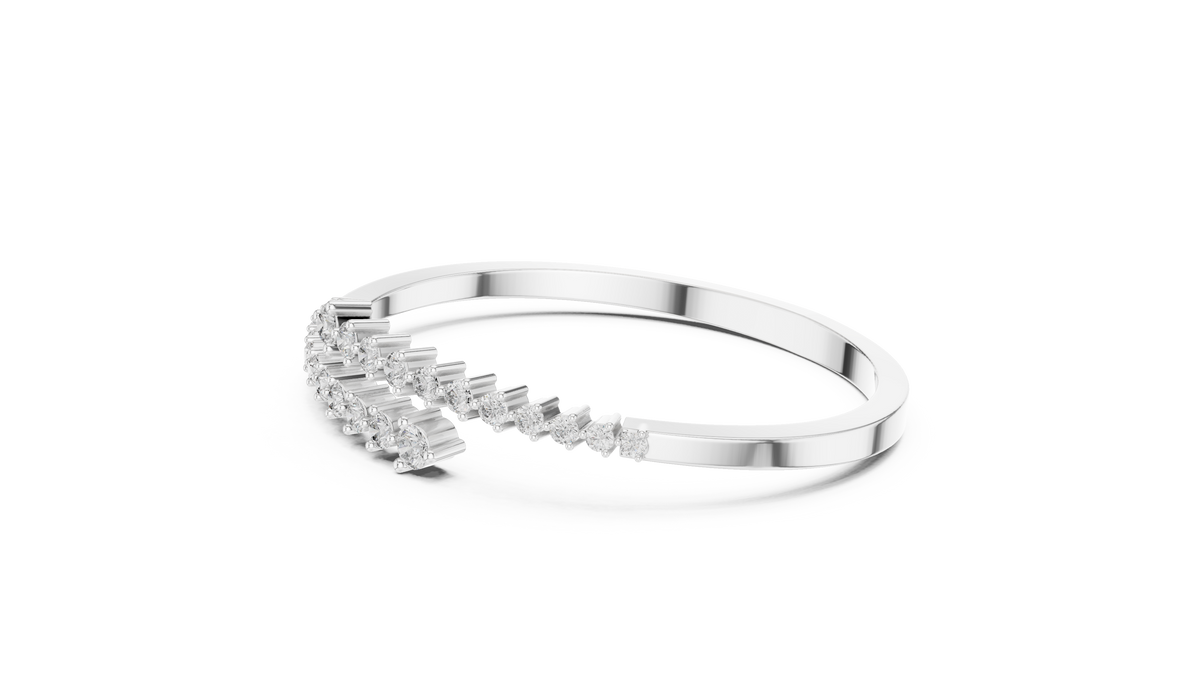 Diamond statement bypass bangle, silver-tone metal with round stones on the front.