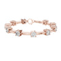 Rose gold diamond chain bracelet with round solitaire stones and bar link settings