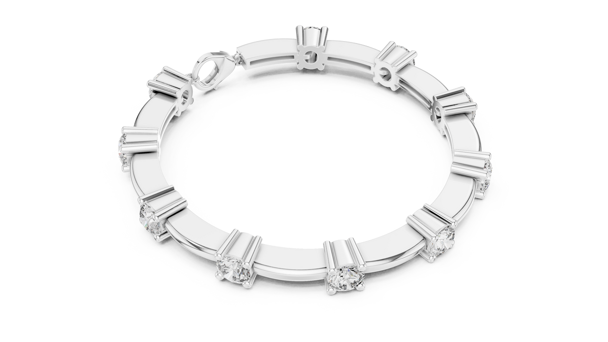 White gold diamond chain bracelet with five round solitaire diamonds encircling the wrist.