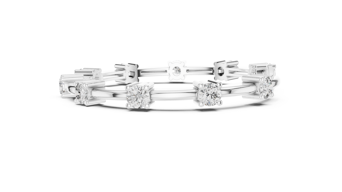 White gold diamond chain bracelet with round solitaire stones and geometric bar links