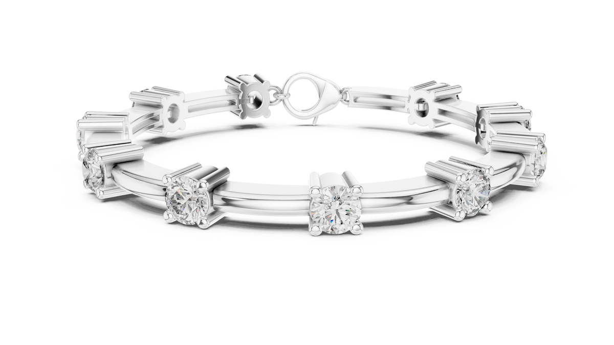 Diamond chain bracelet in white gold with five round solitaire diamonds.