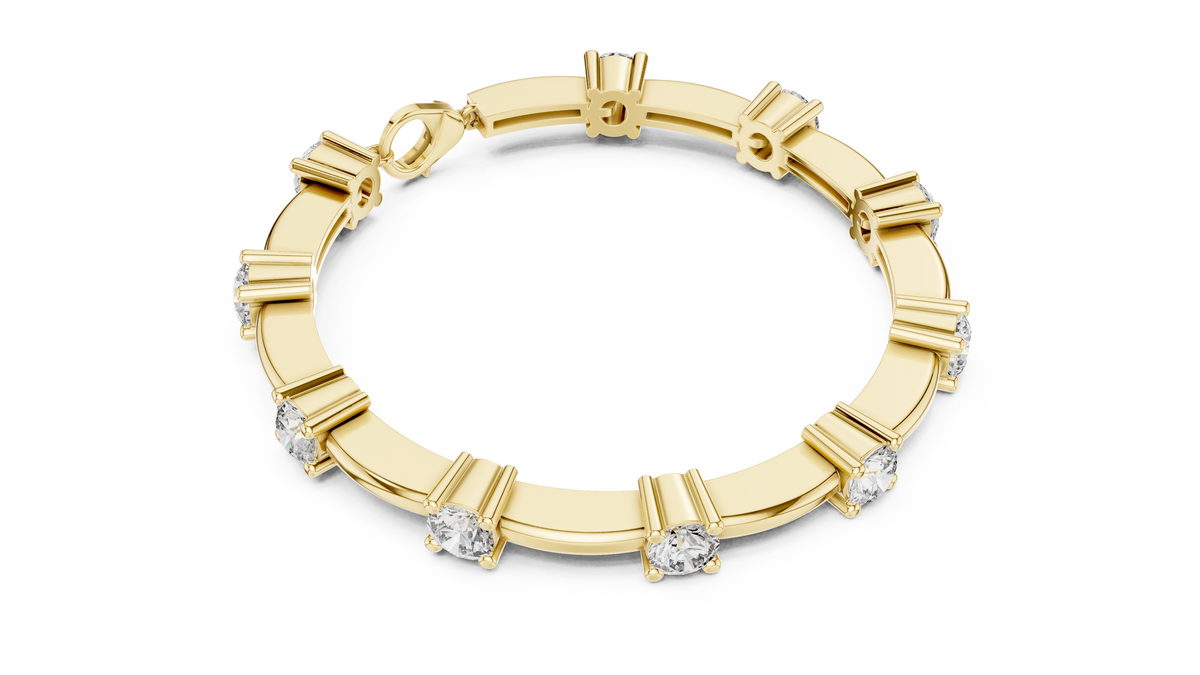 Yellow gold diamond chain bracelet with five round solitaire diamonds on the band.
