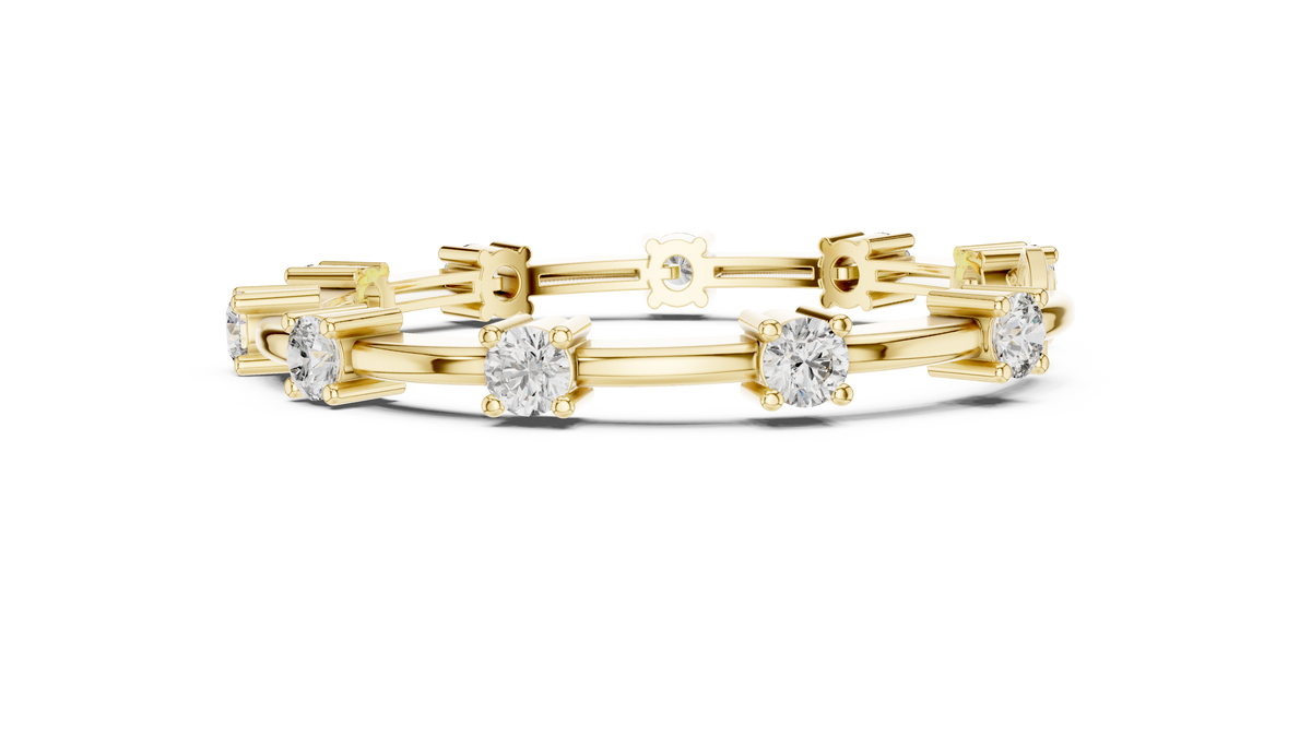 Yellow gold diamond chain bracelet featuring five round solitaire diamonds on the links.