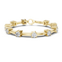 Yellow gold diamond chain bracelet with round solitaire stones and bar link settings