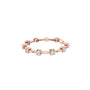 Rose gold diamond chain bracelet with five round solitaire diamonds in a row.