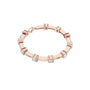 Rose gold diamond chain bracelet with five round solitaire diamonds along the band.