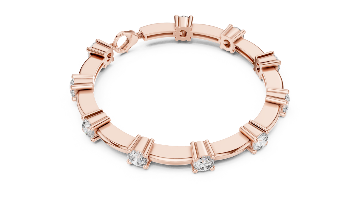 Rose gold diamond chain bracelet with five round solitaire diamonds along the band.