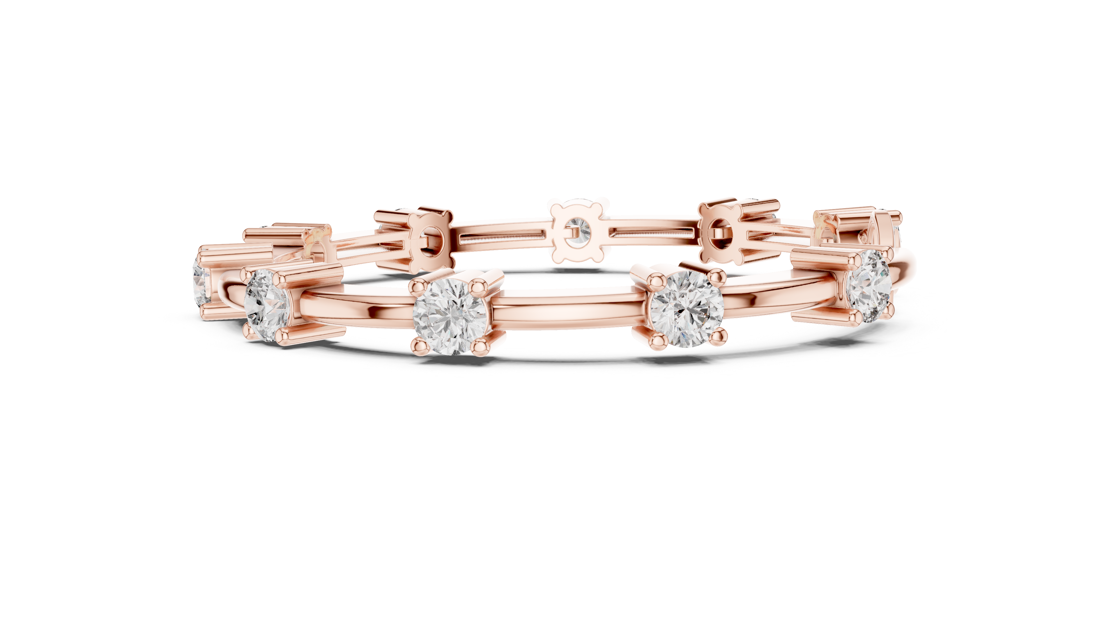 Rose gold diamond chain bracelet featuring five round solitaire diamonds on the links.