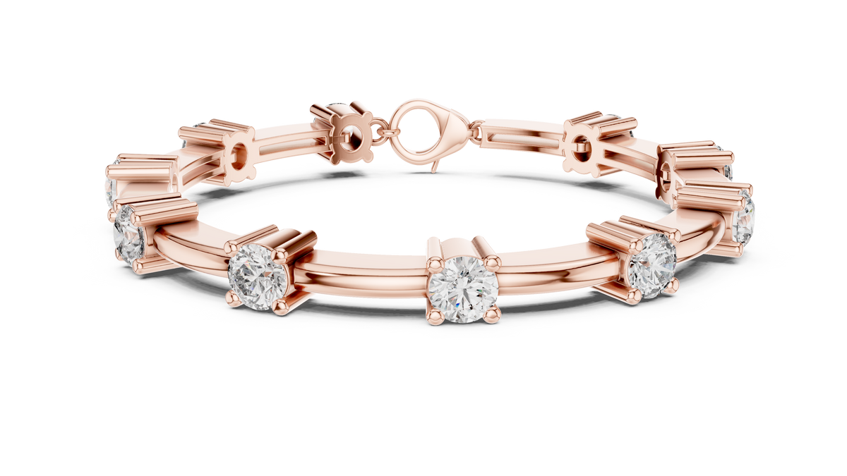 Diamond chain bracelet in rose gold with five round solitaire diamonds.