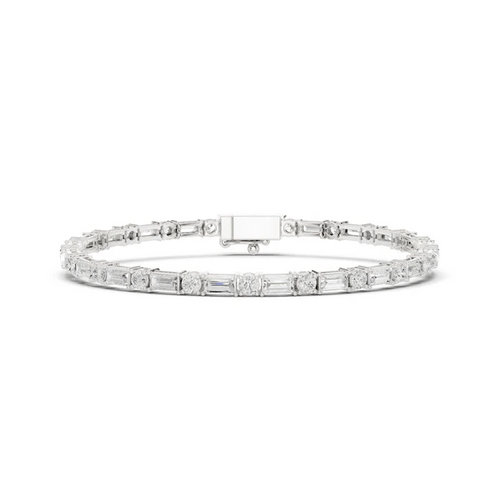 White gold diamond bracelet with mixed-cut stones and rectangular clasp center bar.