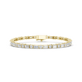 Two-tone diamond bracelet with yellow gold frame and mixed-cut stones in bezels.