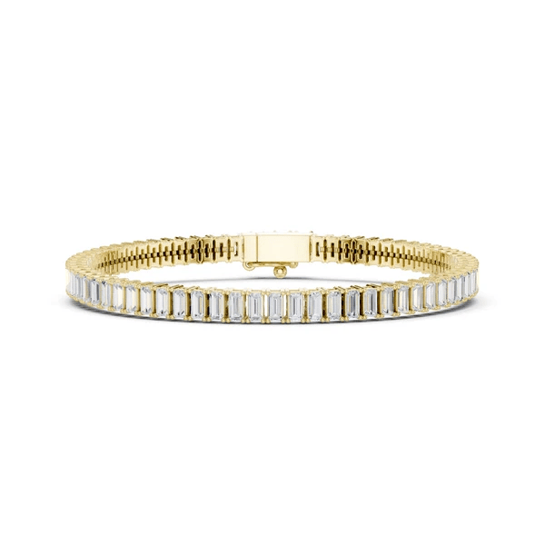 Gold-tone tennis bracelet with baguette-cut diamonds and hinge clasp detail