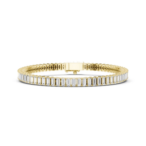 Gold-tone tennis bracelet with baguette-cut diamonds and hinge clasp detail