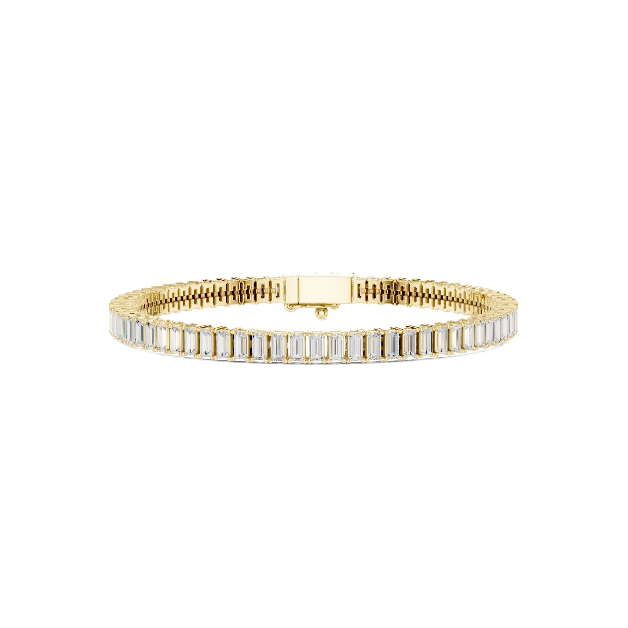 Gold-tone tennis bracelet with baguette-cut diamonds and center clasp bar
