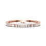 Rose gold-tone tennis bracelet with baguette-cut diamond stations and clasp