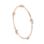 Rose gold diamond bangle with prong-set round stones, hinged cuff