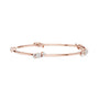 Rose gold diamond bangle with a round center stone and clasp detail