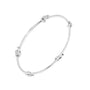 White gold diamond bangle with prong-set round stones, angled side view