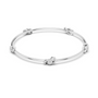 White gold diamond bangle with round center stone and linked diamond accents