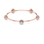 Rose gold diamond floral bangle with a central round flower cluster and side bows