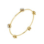 Yellow gold diamond floral bangle with four flower charms and round prong-set stones