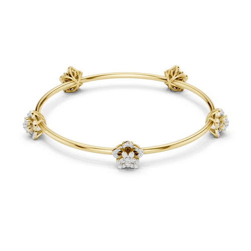 Yellow gold floral diamond bangle with central flower, knotted corners, and round diamonds