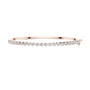 Rose gold tennis-style bangle with round diamonds across the top band