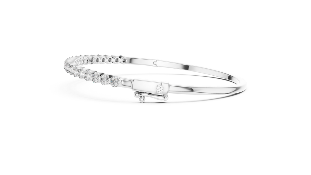 White gold diamond bangle showing side profile with round pavé stones