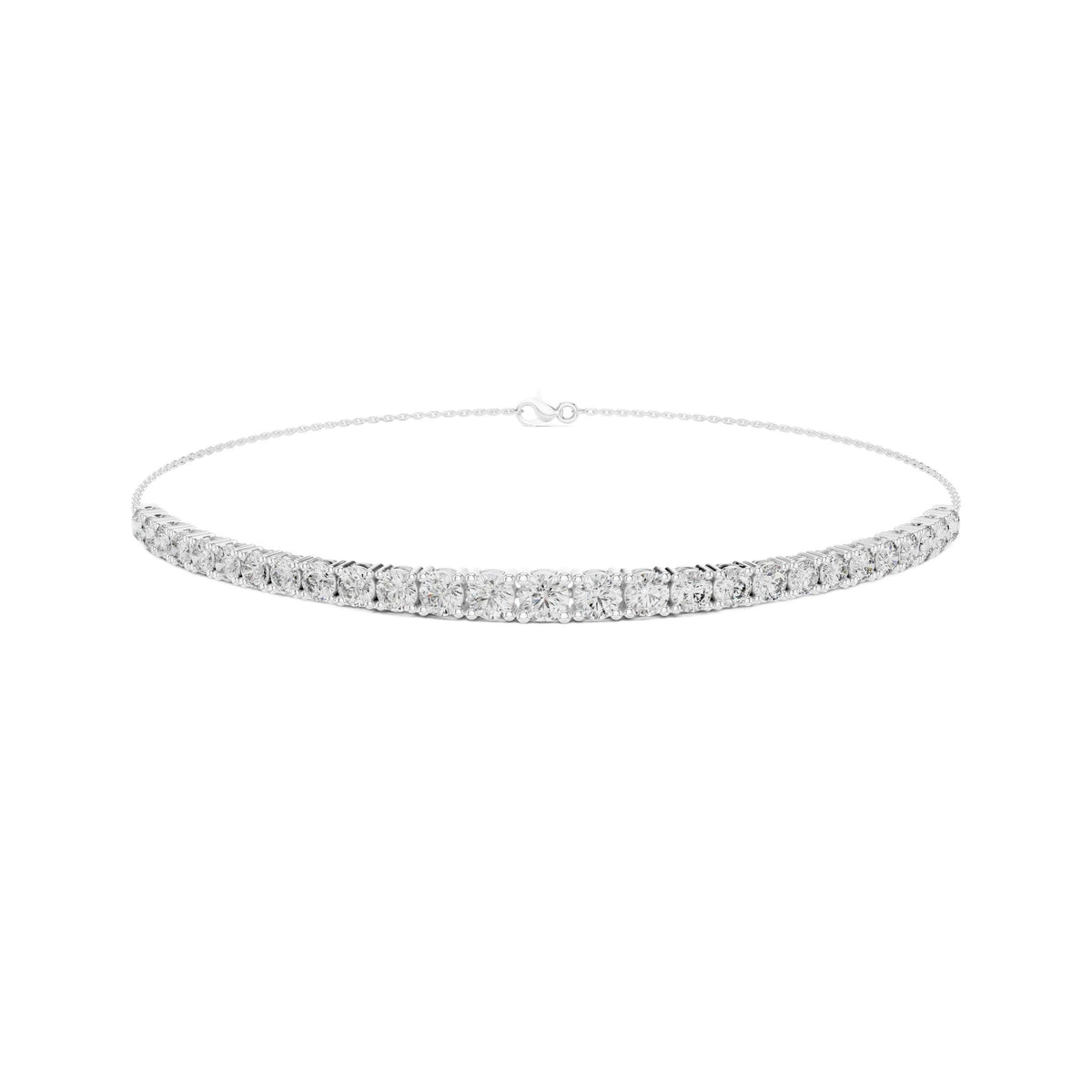 White diamond eternity bracelet with round stones in a channel setting; front view