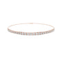 Rose gold diamond eternity bracelet with round stones in a channel setting; front view