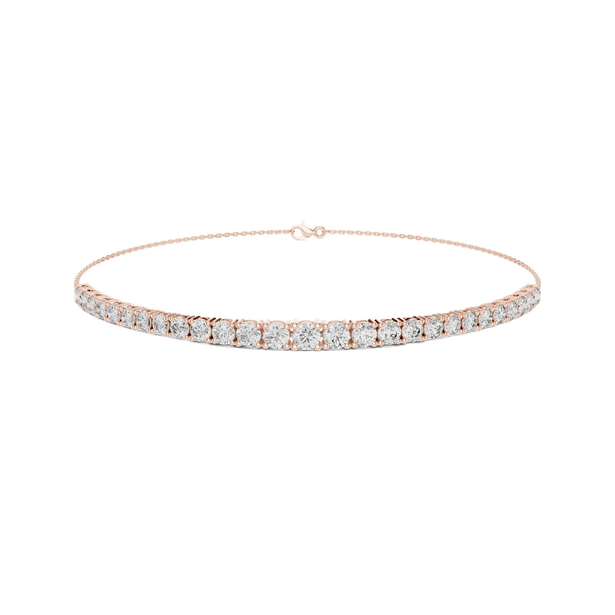 Rose gold diamond eternity bracelet with round stones in a channel setting; front view