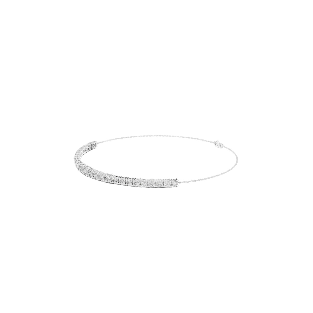 White diamond eternity bracelet with round stones in a channel setting; side view