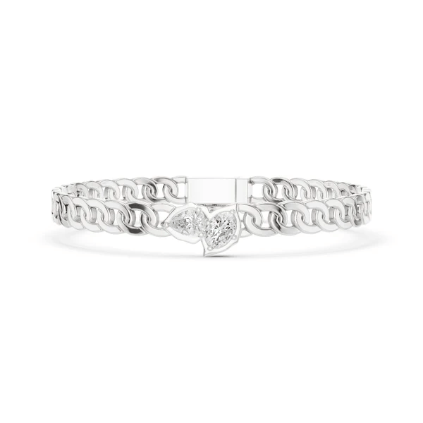 White metal curb link bracelet with heart-shaped diamond center cluster