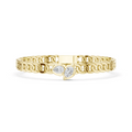 Yellow gold curb link bracelet with heart-shaped diamond centerpiece